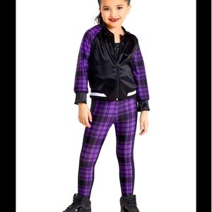 Weissman Purple black bomber jack with sequence unitard.